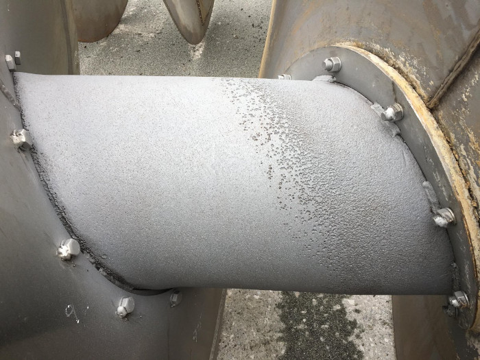 Pitting damage on screw conveyor at sugar refinery
